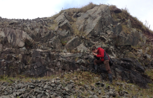 Koen studying the deformation of some of the oldest rocks in Ireland (Ordovician) in Co. Tyrone. Credit: Steve Hollis.